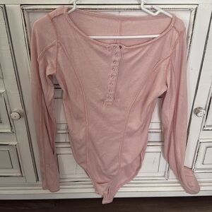 33. Free People Sloane Bodysuit in Pink Nectar